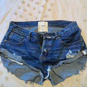 One Teaspoon dark washed denim shorts.